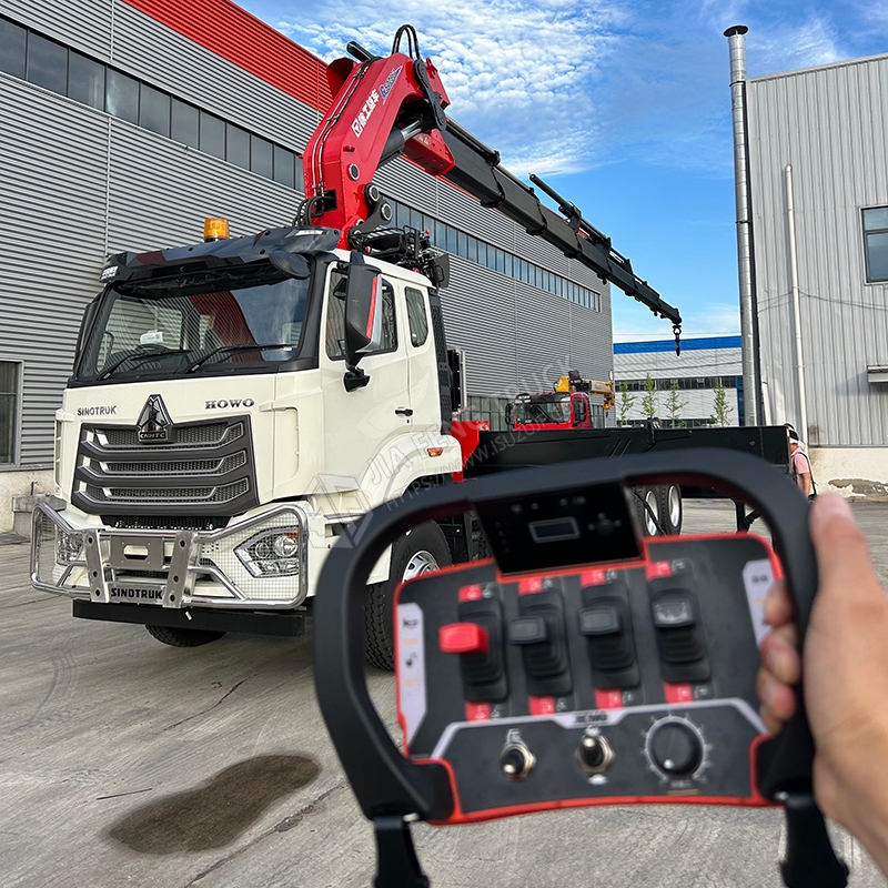 Sinotruk HOWO 8x4 NX Flatbed Mechanical Arm Crane