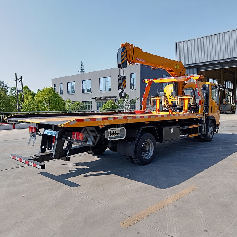 Sinotruk Howo Tow Truck with 2 cars towed